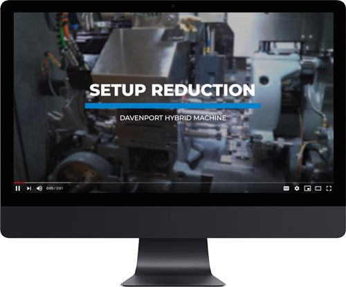 a computer monitor with a screen showing a machine